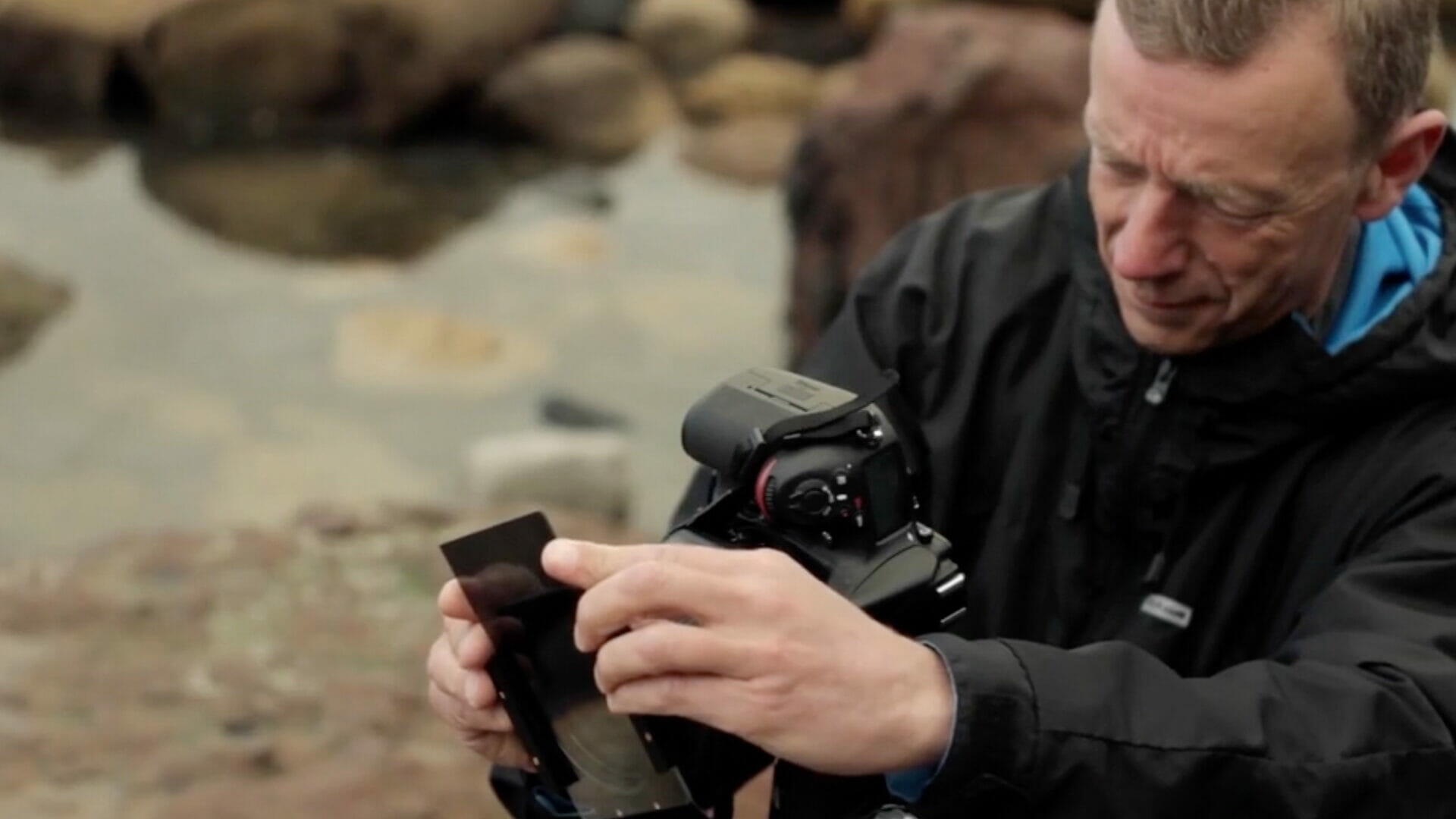 Joe Cornish securing a Neutral Density Grad to his camera
